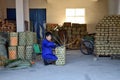 ANHUI PROVINCE, CHINA Ã¢â¬â CIRCA OCTOBER 2017: A Man working inside a tea factory Royalty Free Stock Photo